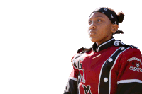 a woman wearing a red black and white uniform with the letter m on it