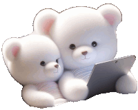 two white teddy bears are sitting next to each other and looking at a tablet