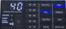 a digital display shows the estimated total cycle time of a dryer