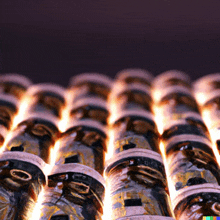 a row of cans are stacked on top of each other with a purple background