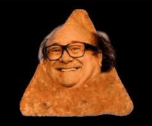 a triangle with a man 's face on it and glasses on a black background .