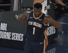 a man in a new orleans jersey is dancing