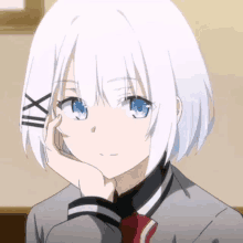 a white haired anime girl with blue eyes is sitting with her hand on her chin .