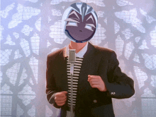 a man in a suit has a mask on his face