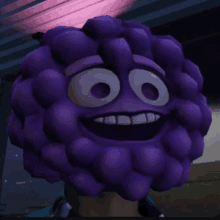 a close up of a purple cartoon character with a big smile on his face