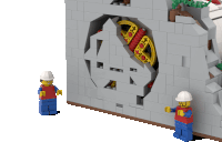 a lego man standing next to a brick wall