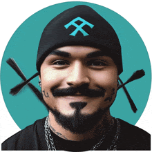 a man with a tattoo on his face wears a black beanie with a blue symbol on it