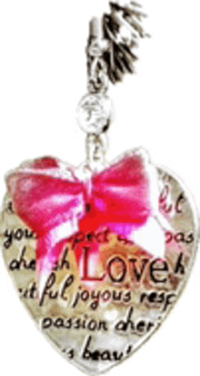 a heart shaped pendant with a pink bow and words that say love