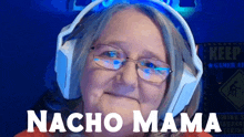 a woman wearing headphones says nacho mama in white letters