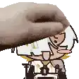 a hand is holding a cartoon character 's head .