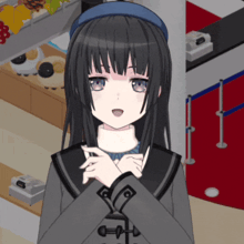a girl with long black hair is wearing a blue headband and a gray jacket