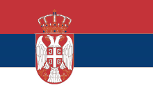 a red white and blue flag with a white eagle and a cross with the letters ec on it