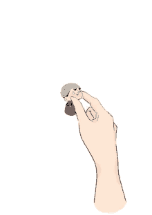 a hand is holding a small figurine of a person on a finger .