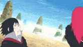 a man and a woman are standing on a beach looking at each other