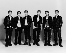 a group of young men standing next to each other