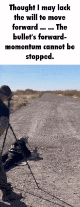 a man taking a picture of a road with a caption that says thought i may lack the will to move forward ...