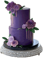 a two tiered purple cake with purple flowers on it