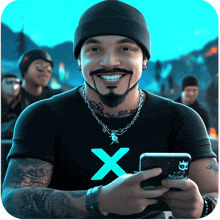 a man wearing a black shirt with an x on it is holding a cell phone