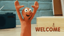 a cartoon character is waving in front of a welcome sign