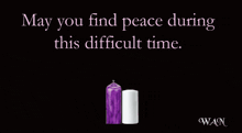 two lit candles with the words may you find peace during this difficult time on the bottom