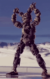 a giant robot is standing on a snowy surface