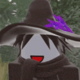 a close up of a person wearing a witch hat with purple flowers on it .