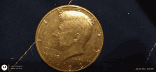 a gold coin that says in god we trust