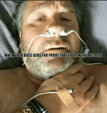 a man in a hospital bed with an oxygen mask on his nose