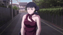 a woman with a bun on her head is praying