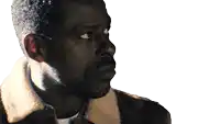 a man in a brown jacket with a white collar