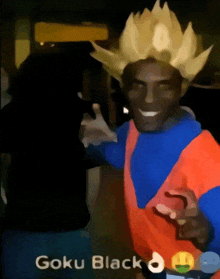 a man dressed in a goku black costume