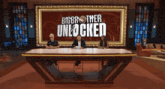 three people sit at a table in front of a big brother unlocked banner
