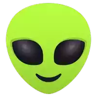 a green alien face with black eyes and a smiling face