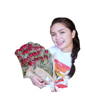 a woman is holding a bouquet of red roses and wearing a shirt that says " with laughter "