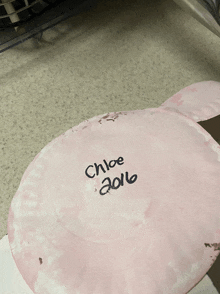 a paper plate with chloe written on it