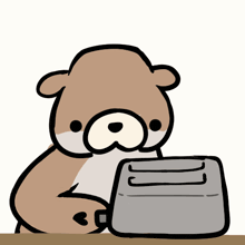 a cartoon bear is sitting at a table with a toaster in front of it