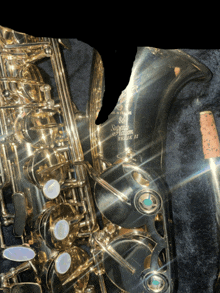 a broken saxophone that says saxophone master on it