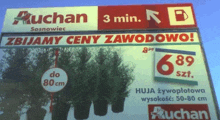 a sign for auchan sosnowiec shows a price of 6.89