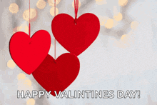 a happy valentines day greeting card with red hearts hanging from a string