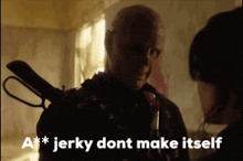 a man with a gun on his back is talking to a woman and says a ** jerky dont make itself .