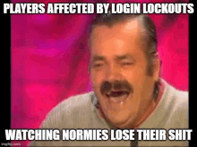 a man with a mustache is laughing in front of a pink background while watching normies lose their shit .