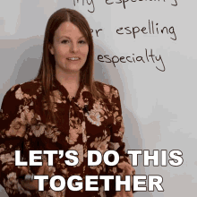 a woman is standing in front of a white board with the words let 's do this together written on it