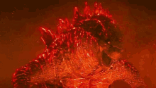 a close up of a monster with red flames on it 's body .