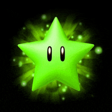 a green star with two eyes and a black nose