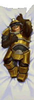 a man in armor is laying on a bed with his head on a pillow .