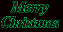 the word merry christmas is glowing in green on a black background