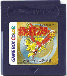 a purple game boy color cartridge with a golden bird on it