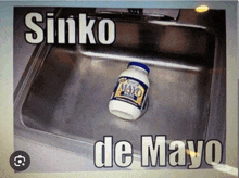 a picture of a sink with a jar of mayo on it