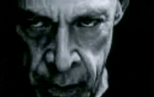 a black and white drawing of a man 's face