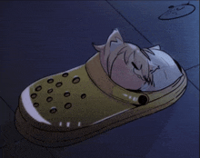 a drawing of a cat sleeping in a yellow shoe